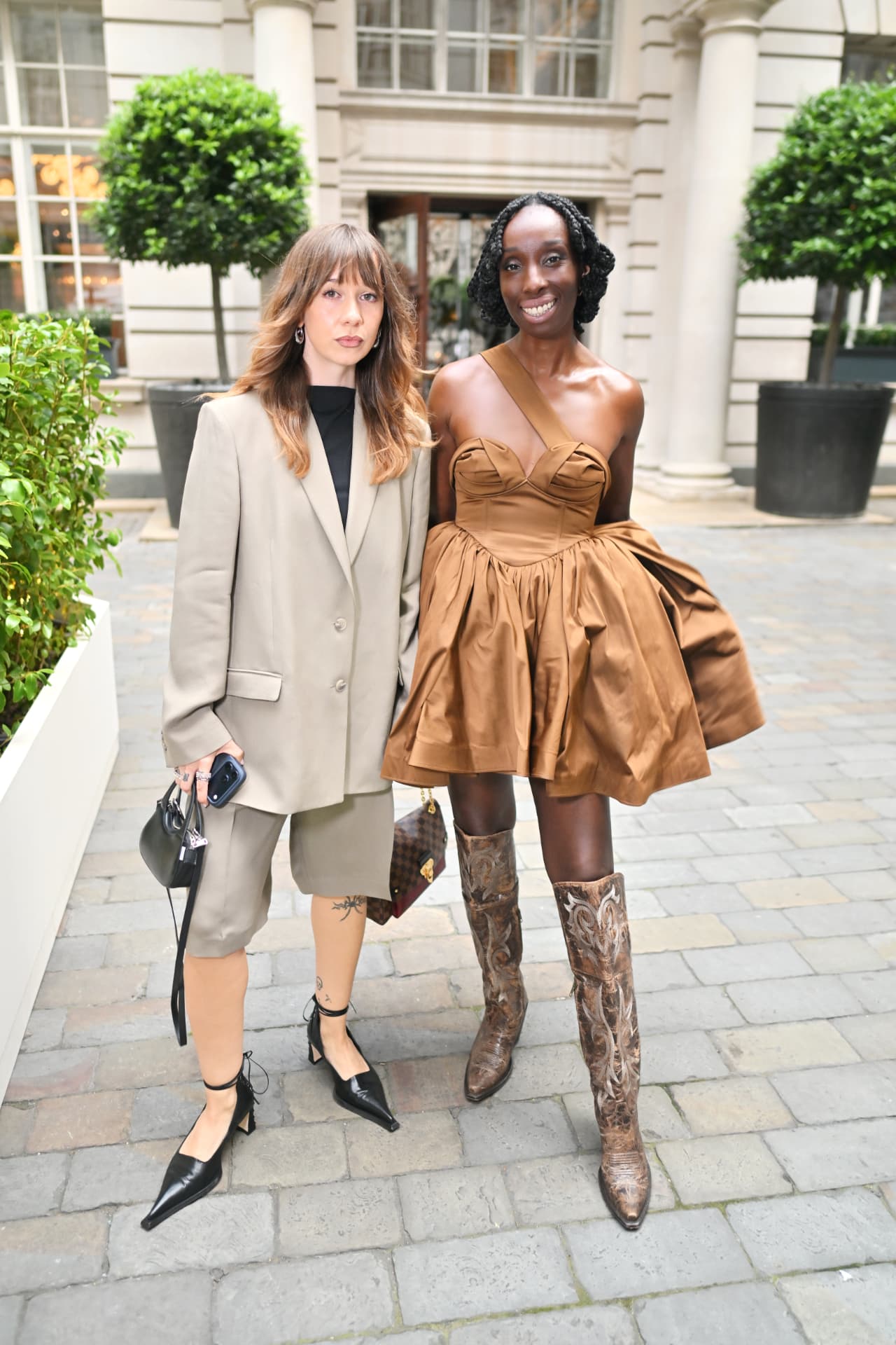 Cat Taylor and Eunice Olumide arriving at The New Ownership